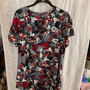 Woman’s Disney multi colored shirt,